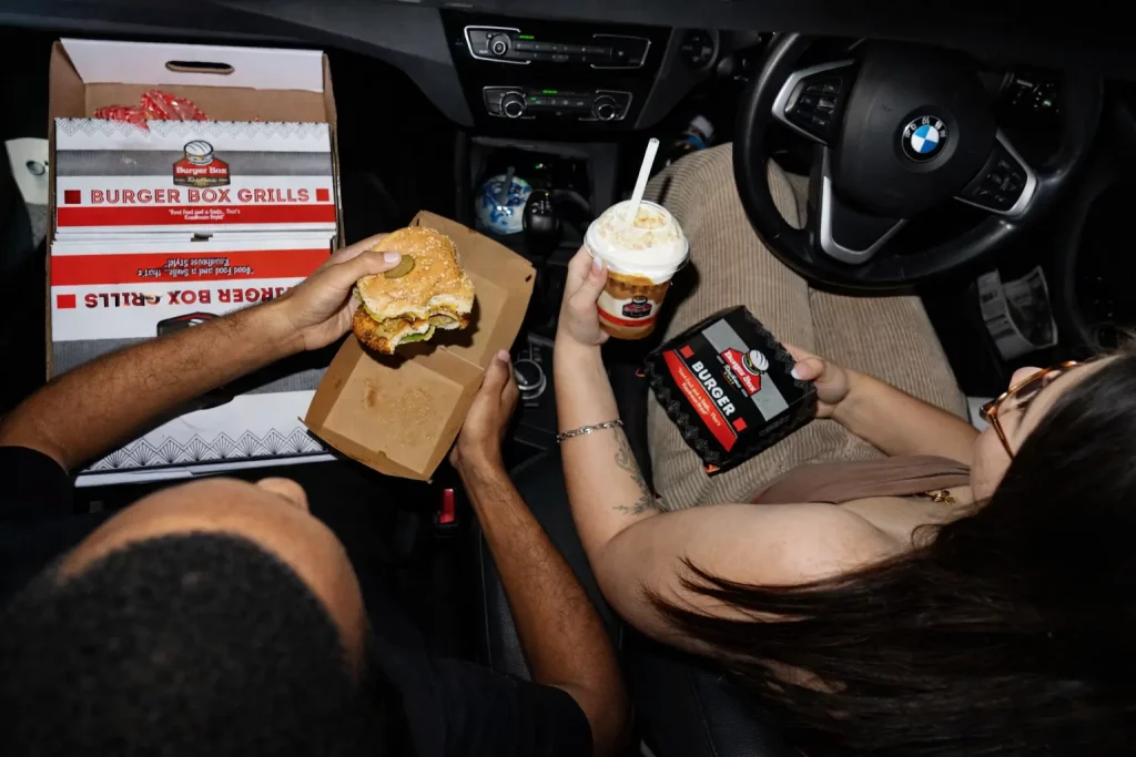 Burger Box gallery showing burgers, shakes, roadhouse meals and branch moments
